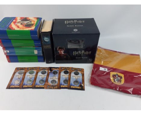 HARRY POTTER - an as-new Harry Potter mini-statue by Gentle Giant, an unopened Gryffindor scarf and 12 Harry Potter coins in 