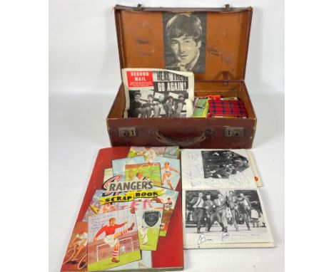 A vintage suitcase containing childhood memories from the 1950/1960s.  Includes an interesting little booklet with clippings 