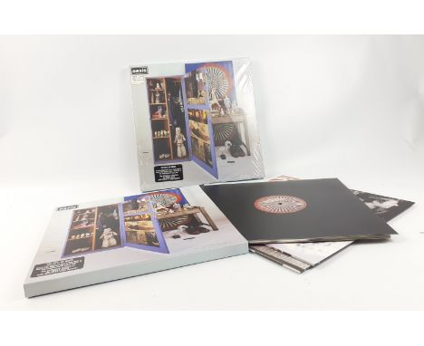 For the OASIS enthusiast.  TWO SET of STOP THE CLOCKS boxed set, one opened and one pristine in shrink wrap with original Vir