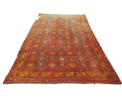 A large Turkish Ushak carpet, west Anatolia, late 19th / early 20th century, 685 x 435cm.
