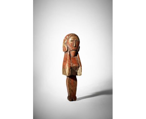 A rare painted treen lever action nutcracker, carved with the head of a man with a flat face and with stylised hair, with own