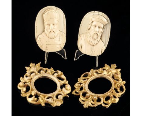 λ A pair of Italian carved ivory portrait relief plaques, one of a Bishop the other of bearded man sporting a cap, 18th / 19t