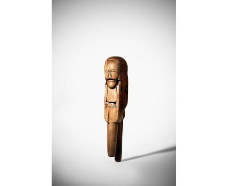 A rare treen lever action nutcracker, carved with the head of a man, with a flat face and engraved with owner's name 'Geoe Ho