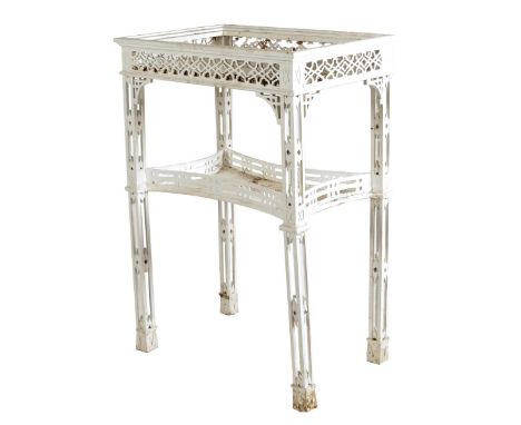 A white painted jardiniere stand in Chinese Chippendale style, with fretwork decoration with a concave undertier, 111 cm high
