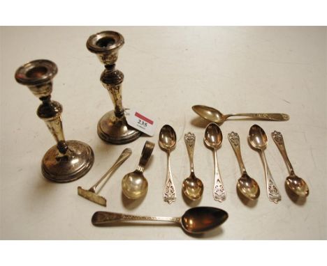 Assorted silverwares to include teaspoons, pusher, caddy spoon, pair candlesticks, etc