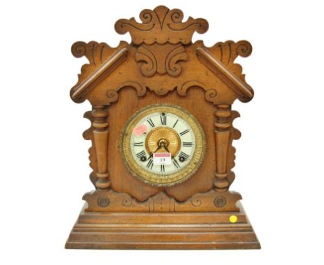 An Ansonia Clock Company of New York walnut cased mantel clock with striking movement, early 20th century 