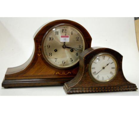An Edwardian inlaid mahogany striking mantel clock, and an oak mantel clock (2)