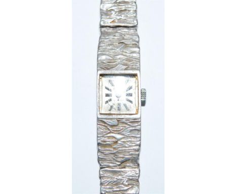 An Accurist silver cased ladies cocktail watch, having manual wind movement and barklink bracelet