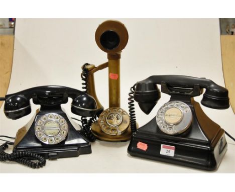 A Bakelite cased telephone, one other, and a lacquered brass candlestick telephone (3)