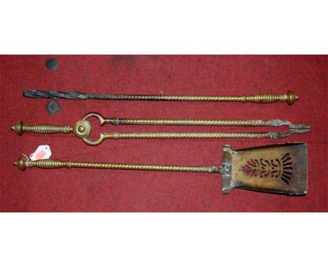 A set of three 19th century turned brass fire tools