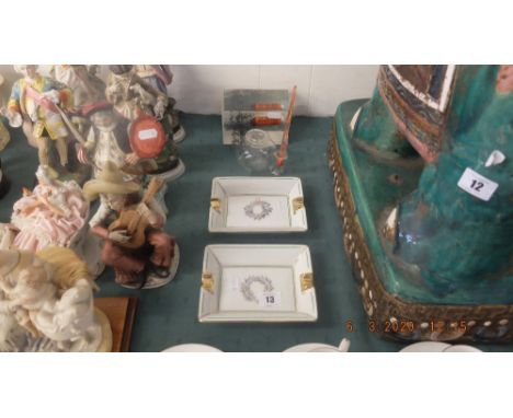 A vintage Elley Grand Prix paperweight, two long ashtrays and Murano dip pen holder