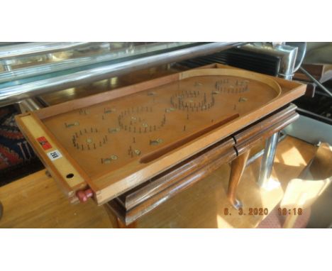 A 1950's Chad Valley bagatelle board