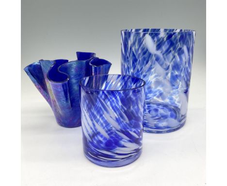 Beautiful iridescent handkerchief vase with ruffled opening with cobalt marbled ground. The votive holder captures the beauti