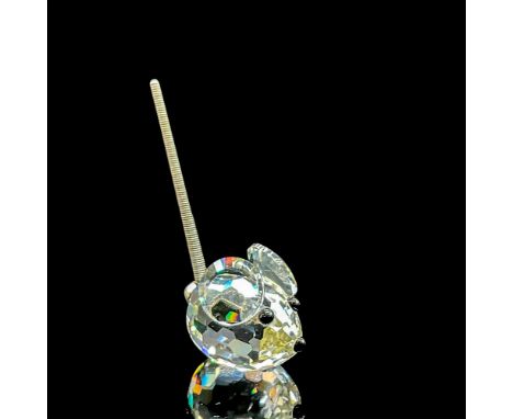 Clear faceted crystal tiny figure of a mouse with a metal spring tail. Swarovski mark. Item number 7655NR23. Part of the In A