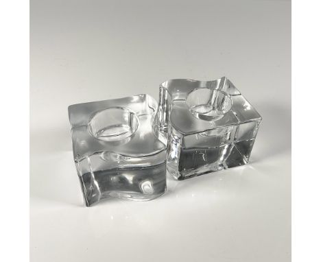 Clear thick crystal duo, each has a square-wave shape. Orrefors etched backstamp. Artist: Helen KrantzDimensions: 3.25''L x 3