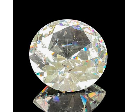 Gorgeous facets on this diamond paperweight. Swarovski backstamp. 7433 000 000. This item has its original box: 4"H x 5"dia..