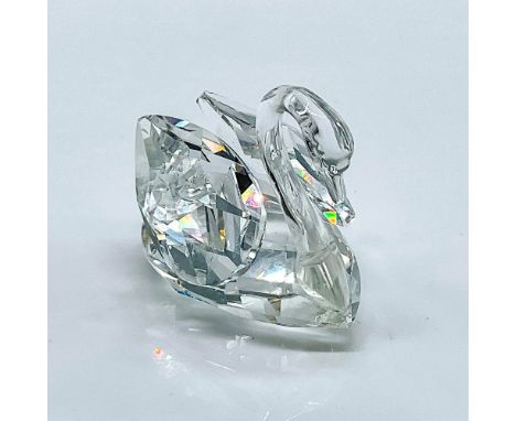 Multifaceted clear crystal swan. Item number 7633NR050. Swarovski etched backstamp. This item has its original box, 2.5"H x 3