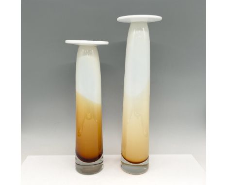 Blended amber and opal glass with white glass flat holder. Set includes 12" &amp; 14" pillar. Evolutions by Waterford mark. I