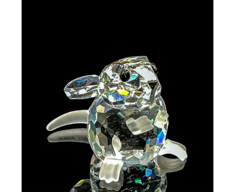 Clear faceted crystal tiny figure of a mouse with frosted hands, feet and tail. Swarovski mark. Item number 7631NR025000. Par