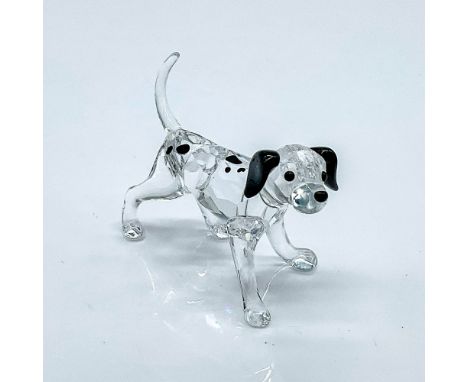 Multifaceted clear crystal dalmatian with black eyes and ears, and spots. Swarovski etched backstamp. This item has its origi