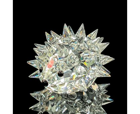 Clear crystal spiky hedgehog with black nose and eyes. Swarovski etched backstamp. Swarovski mark. Item number 7669NR035000. 