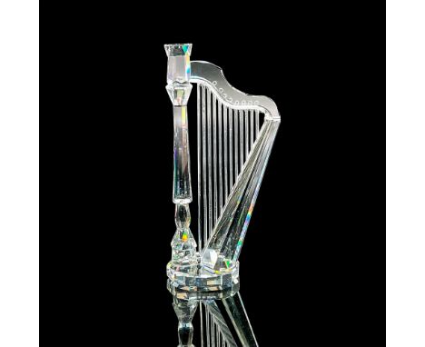 Stunning faceted crystal figure of a harp. Swarovski mark. Item number 7477NR000003. Part of the Crystal Melodies collection.