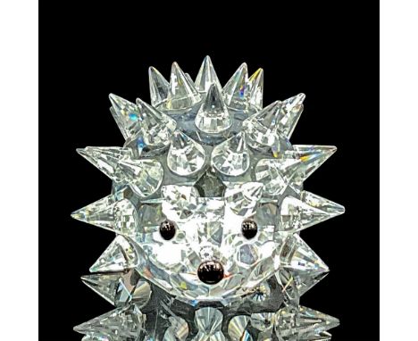 Clear crystal spiky hedgehog with black nose and eyes. Swarovski etched backstamp. Swarovski mark. Item number 7669NR35. This