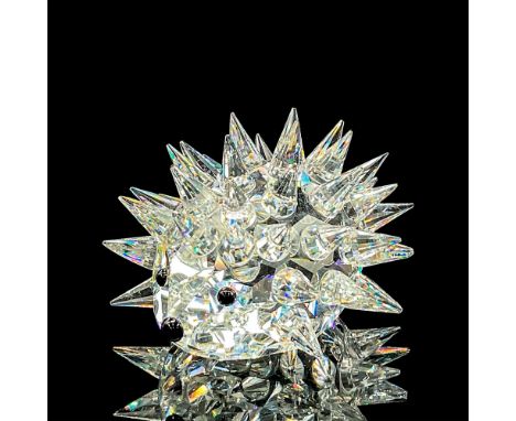 Clear crystal spiky hedgehog with black nose and eyes. Swarovski etched backstamp. Swarovski mark. Item number 7630NR045000. 