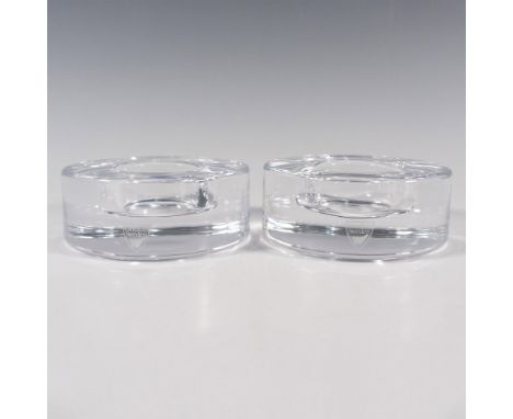 A set of 2 clear crystal votive cylindrical candle holder. Orrefors stickered. One candle holder has its original box: 4.5"L 