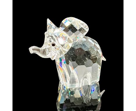 This Swarovski crystal large elephant is made from clear crystal with black eyes and a small, frosted crystal tail. Item come