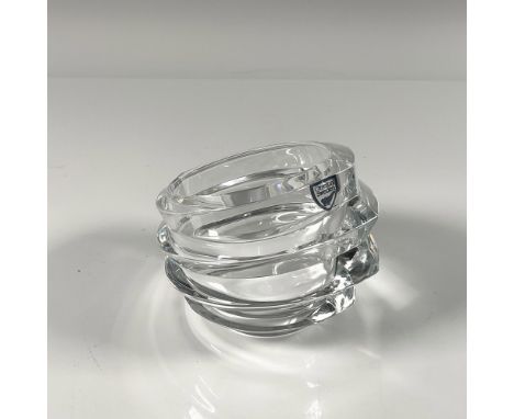 Thick clear crystal, designed in a hollow oval layered shape. Orrefors etched backstamp, and rim stamp. Includes a little can