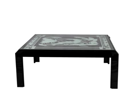 This striking original Art Deco revival black lacquered wood coffee table is made with a deeply etched frosted glass top on a