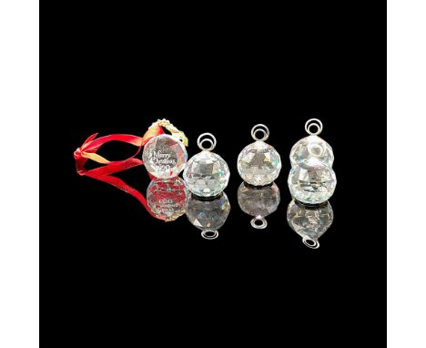 Includes 4 round faceted crystals with rhodium stem to hold cards 7403 030 002 and 1 Merry Christmas 1990 ornament. Swarovski