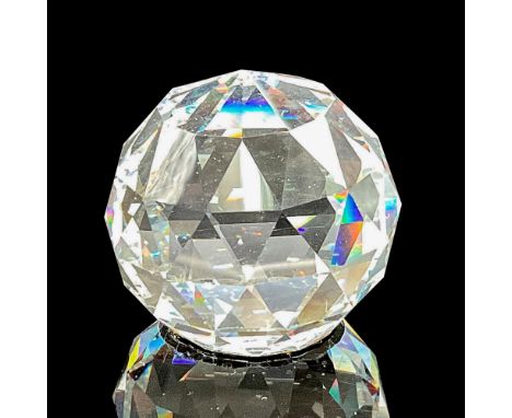 Clear faceted round base ending at pointed center. Swarovski backstamp. 7404 050 087. This item has its original box: 4"H x 3