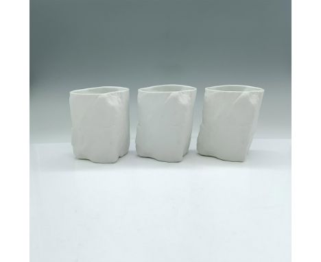 These ceramic cups are textured to imitate the surface of a rocky cliff. Dimensions: 3"L x 2.5"W x 3.75"HManufacturer: Hakusa