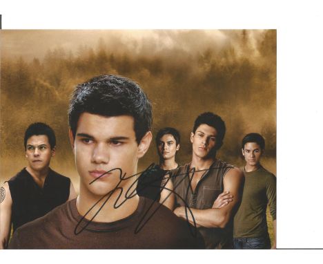 Taylor Lautner signed 10 x 8 colour portrait photo from Twilight. Good Condition. All autographs are genuine hand signed and 