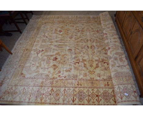 LARGE CARPET, THE CENTRAL PANEL WITH STYLISED GEOMETRIC AND FLORAL DECORATIONS, APPROX 242 X 292CM