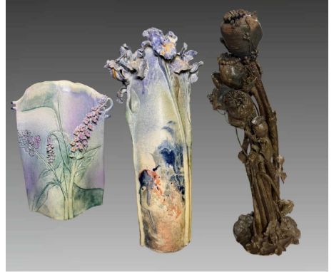 Elaine Hind, RBSA (British, b.1945), two floral encrusted vases, with relief irises, 52.5cm high, and lilac, 27.5cm high toge
