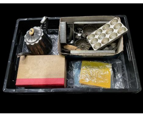 Kitchenalia including 19th/early 20th century metal moulds with Mrs Beeton’s Household Management book, two recipe books and 