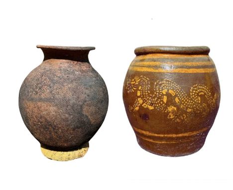 A globular-form garden pot, glazed in brown with yellow glazed dragon and stripe decoration, height 39cm, together with a rou