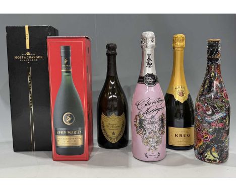 Dom Perignon Champagne, 2000, one bottle, Krug, one bottle, Christian Audigier, two bottles, Moet, one bottle, (boxed), Remy 