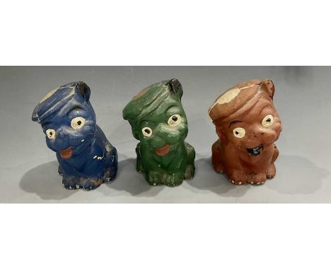 Three terracotta Bonzo/bulldog figurines, each moulded wearing a beret and painted green, blue and red, 9cm high