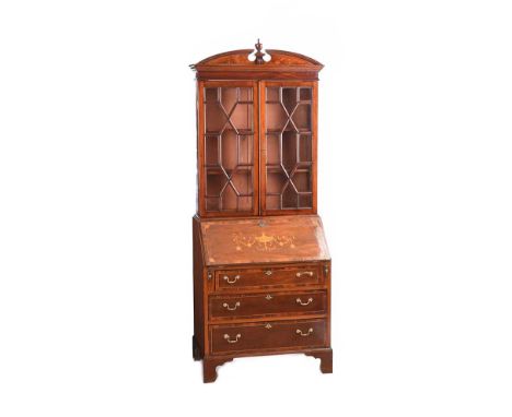 EDWARDIAN INLAID MAHOGANY TWO DOOR BUREAU BOOKCASE WITH BRASS DROP HANDLES.RAISED ON BRACKET FEET.HEIGHT: 78 INCHES.WIDTH: 31