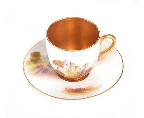 ROYAL WORCESTER CUP AND SAUCER.NO. 9005.HAND PAINTED.CASTLE SCENE. SIGNED R. RUSHTON.CUP HEIGHT: 2 INCHES.SAUCER DIAMETER: 4 