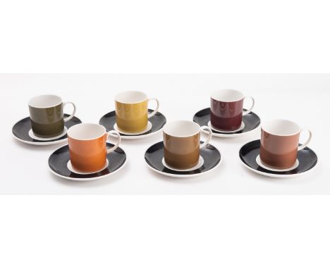 A Mid Century Susie Cooper 'Harlequin' pattern six piece coffee set. Comprising six coffee cans in various colours with black