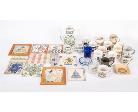 A collection of contemporary painted tiles. With a range of decorations together with coronation mugs, Reims blue drinking gl