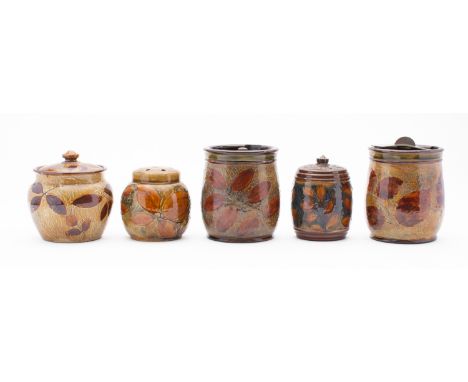 A pair of Royal Doulton natural foliage tobacco jars. Showing ash leaves on a greenish ground, complete with lids, monograms 