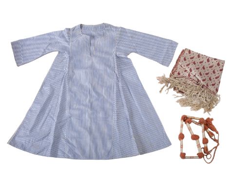 A mid 20th century child's costume. In the Egyptian style with a blue and white striped tunic and white head scarf with red d