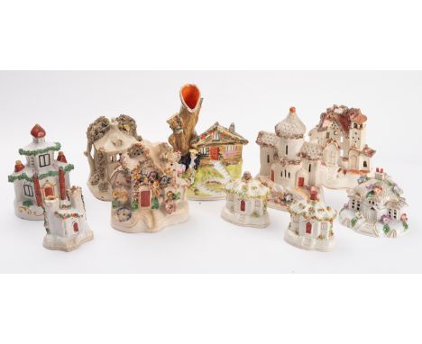 A collection of ten Staffordshire Pastel burners, In the form of houses including Georgian style examples, all having encrust