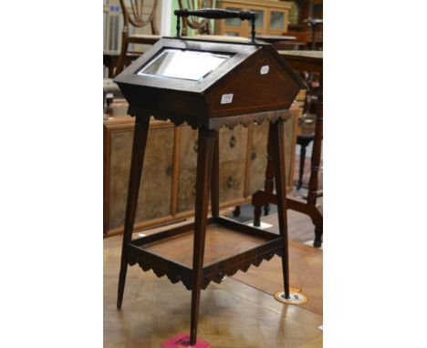 A 19th century satinwood and ivory string inlaid rosewood bijouterie cabinet, the twin doors below a handle, raised on four l